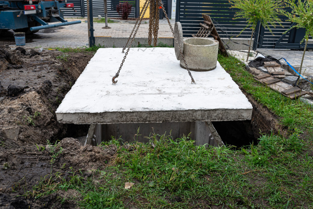 Installation d'une dalle en béton sur fosse